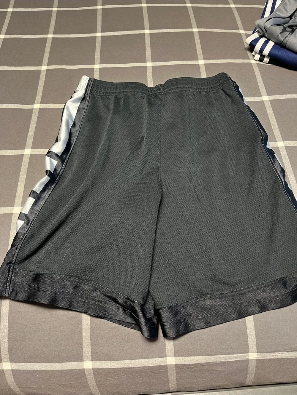 Nike Black Athletic Basketball Shorts with White Swoosh